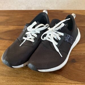 Black and White New Balance Shoes
